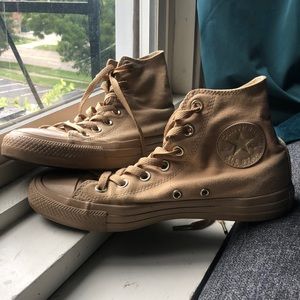 lightly worn tan converse with gold eyelets